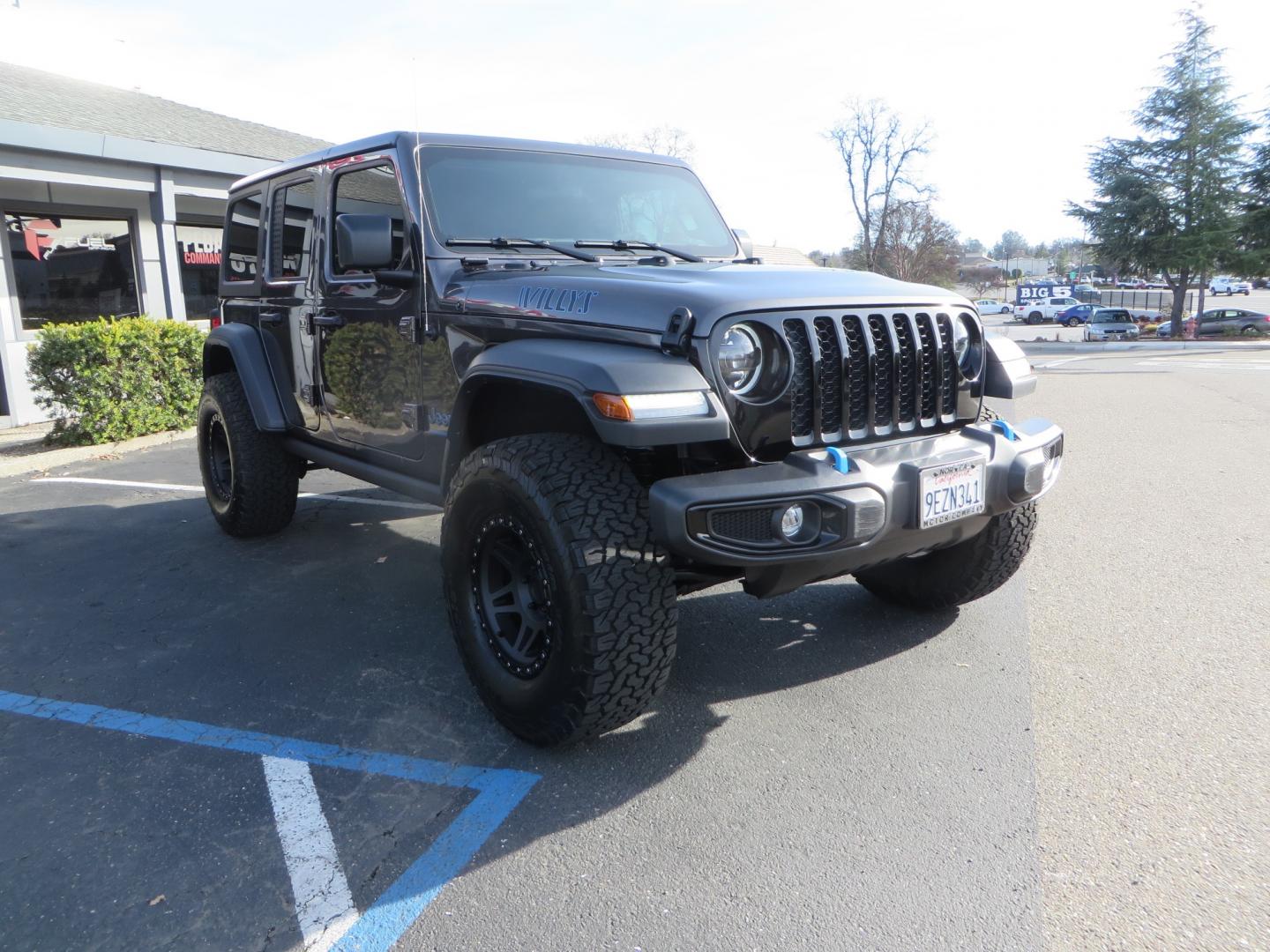 2023 CHARCOAL /black Jeep Wrangler Unlimited Willys 4XE (1C4JJXN68PW) with an 2.0L L4 DOHC 16V HYBRID engine, 8A transmission, located at 2630 Grass Valley Highway, Auburn, CA, 95603, (530) 508-5100, 38.937893, -121.095482 - 3" Zone Offroad lift kit, Fox Adventure series shocks, 17" Method Race wheels, 37" BFG KO2 tires, and a Teraflex spare tire carrier. - Photo#2